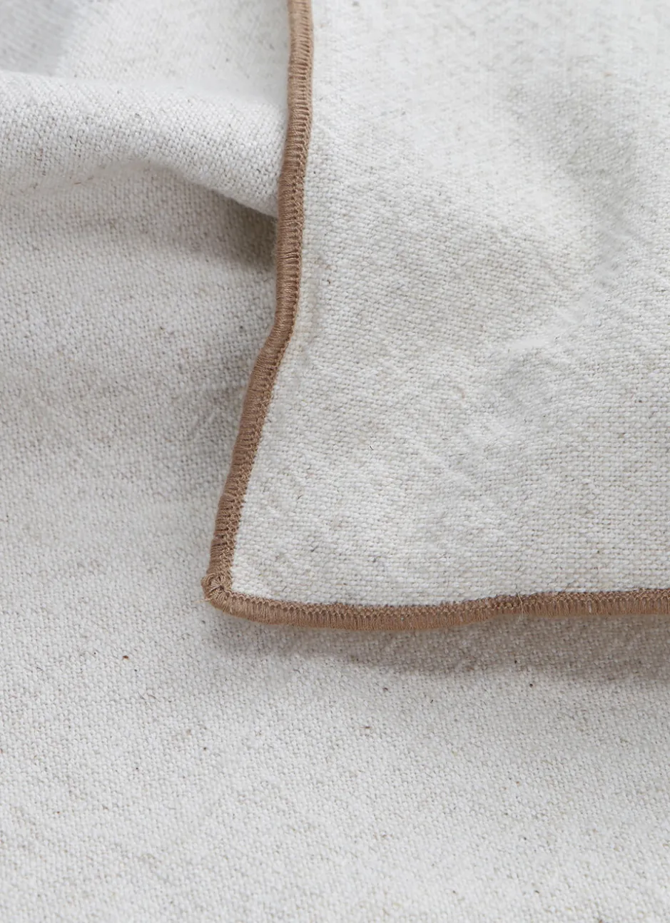 COUSSIN UNI CHINÉ AVEC BOURDON CONTRASTÉ BEIGE