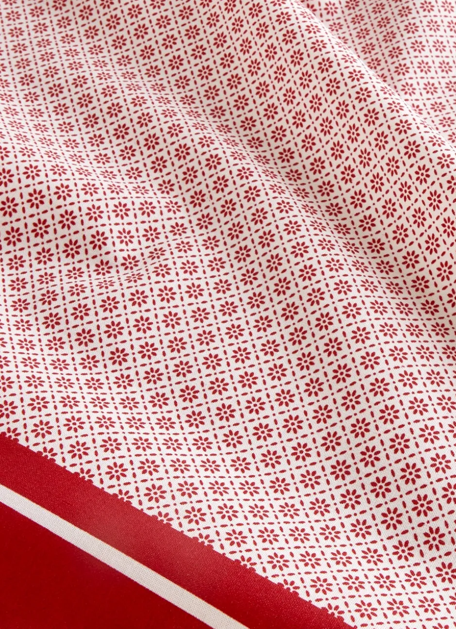 NAPPE EN COTON ENDUITE MOTIF FANTAISIE BLANC/ROUGE