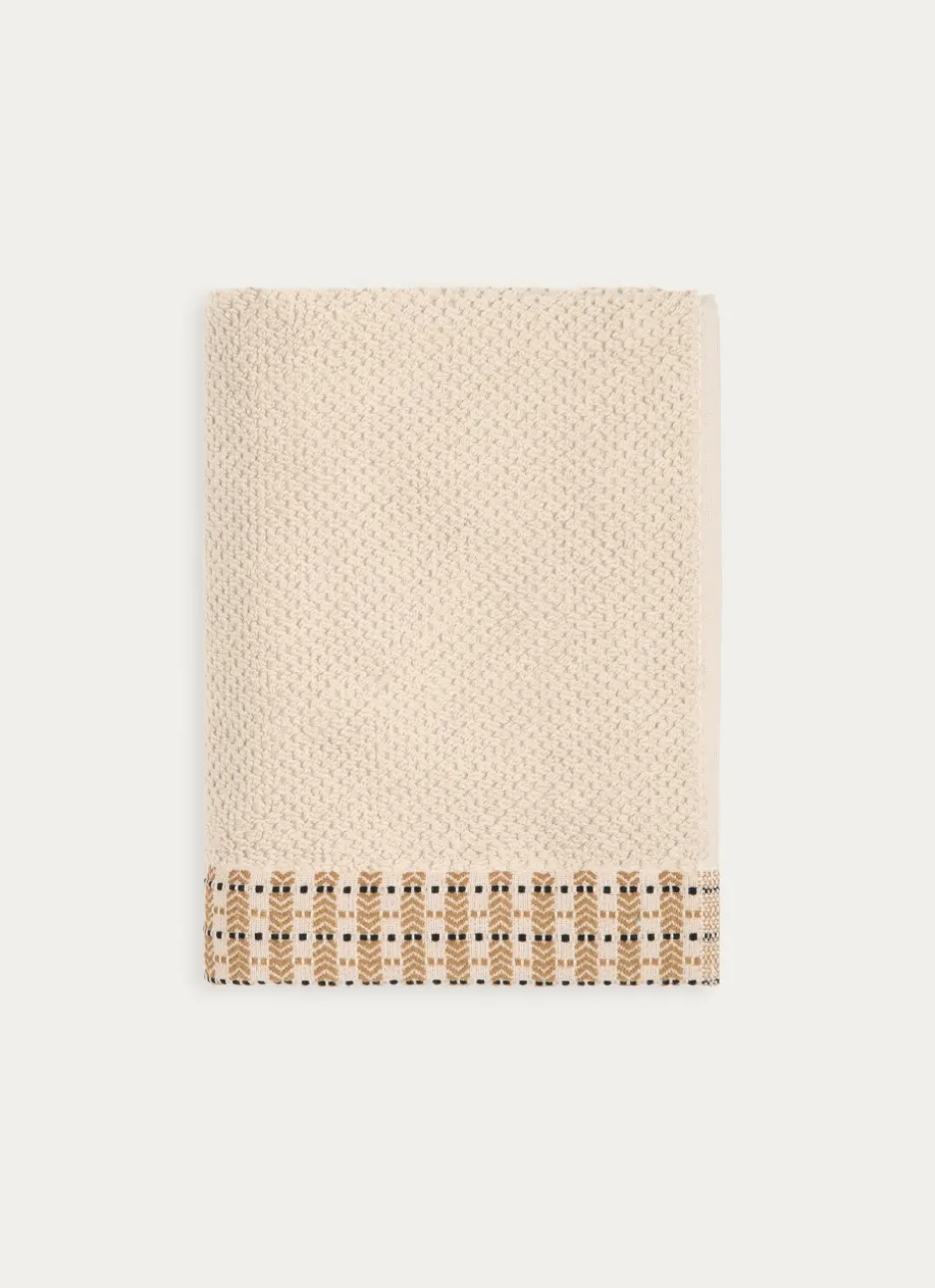 SERVIETTE DE TOILETTE UNIE AVEC LITEAU FANTAISIE BEIGE