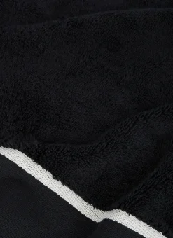 SERVIETTE DE TOILETTE UNIE À LARGE BORDURE ARTHUR Noir